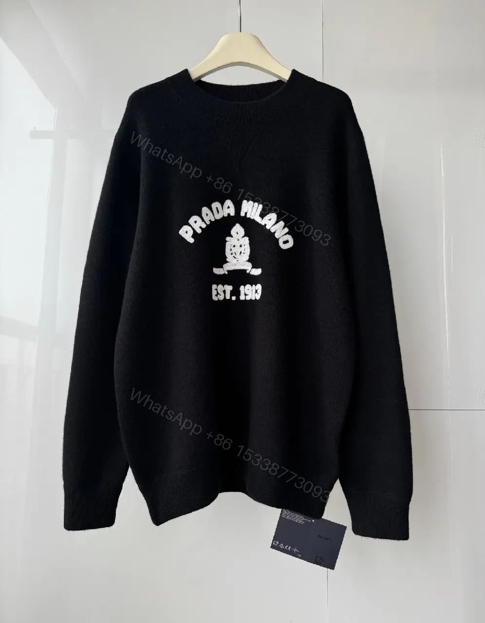 Black Wool-Blend Knit Sweater Crest Embroidery Version — view 1