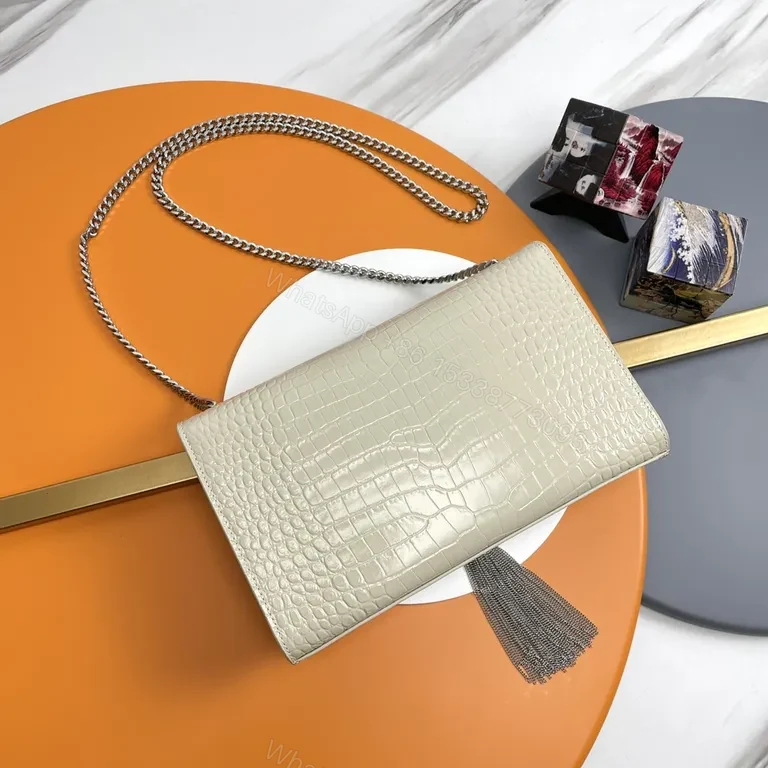 View 7 of Crocodile-Texture Flap Bag: Cream + YSL Tassel Flair