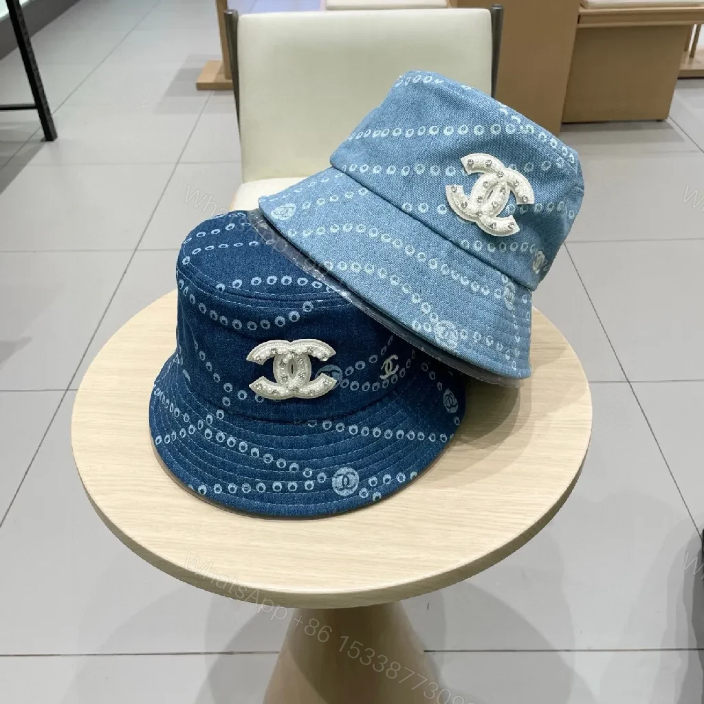 View 2 of Denim-Threaded Bucket Hat with Emblem: Bold, All-Season Style