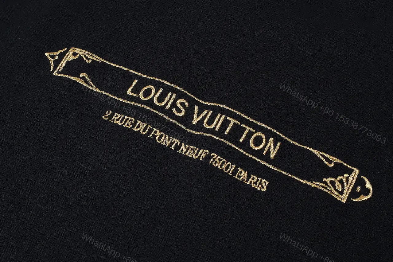 View 2 of Black Cotton Graphic Tee with Gold Logo Bar