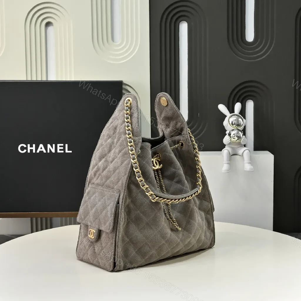View 5 of Gray Quilted Bucket Bag with Gold Chain – Modern Texture, Everyday Versatility