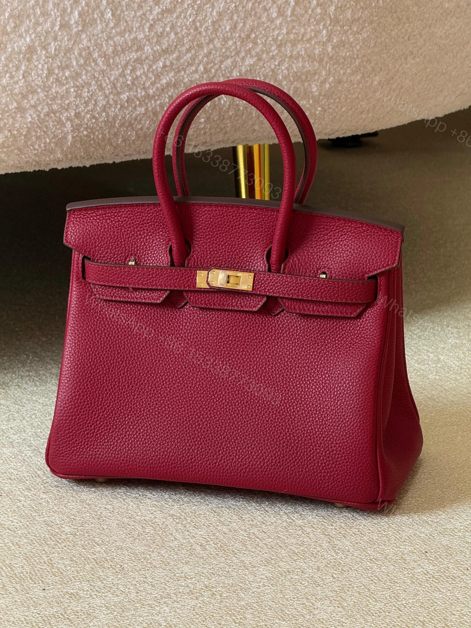 Hermès Birkin bag in a Red Shade of Togo Leather — view 1