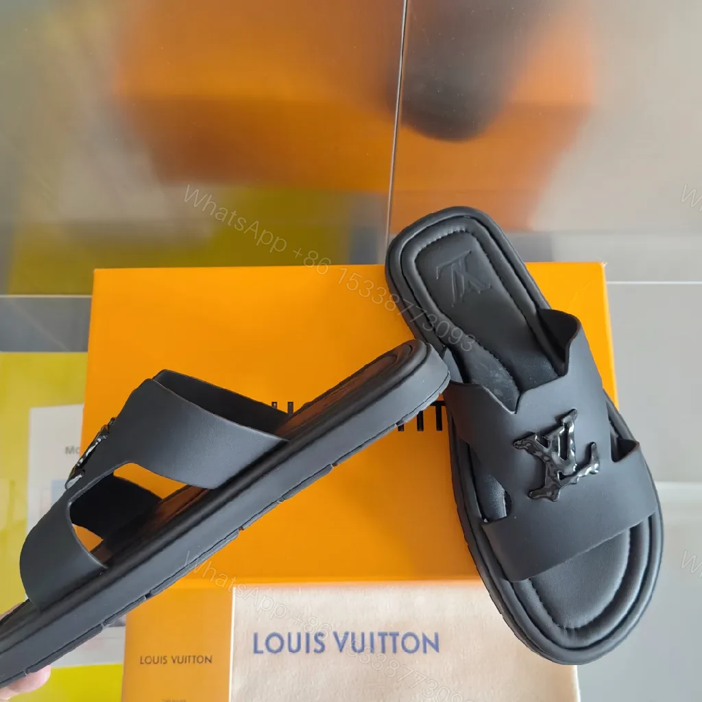 View 5 of Minimalist Black Leather Slides with Signature Emblem