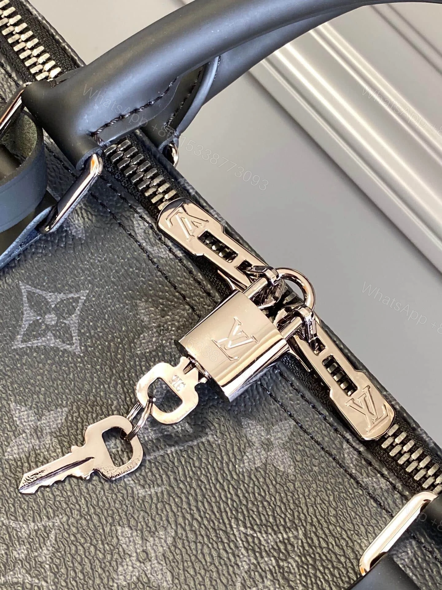 View 3 of SUMMER SET: LOUIS VUITTON KEEPALL BANDOULIÈRE 50 MONOGRAM ECLIPSE & LONG WALLET MONOGRAM ECLIPSE TRUNK ZIPPY BLACK 19CM