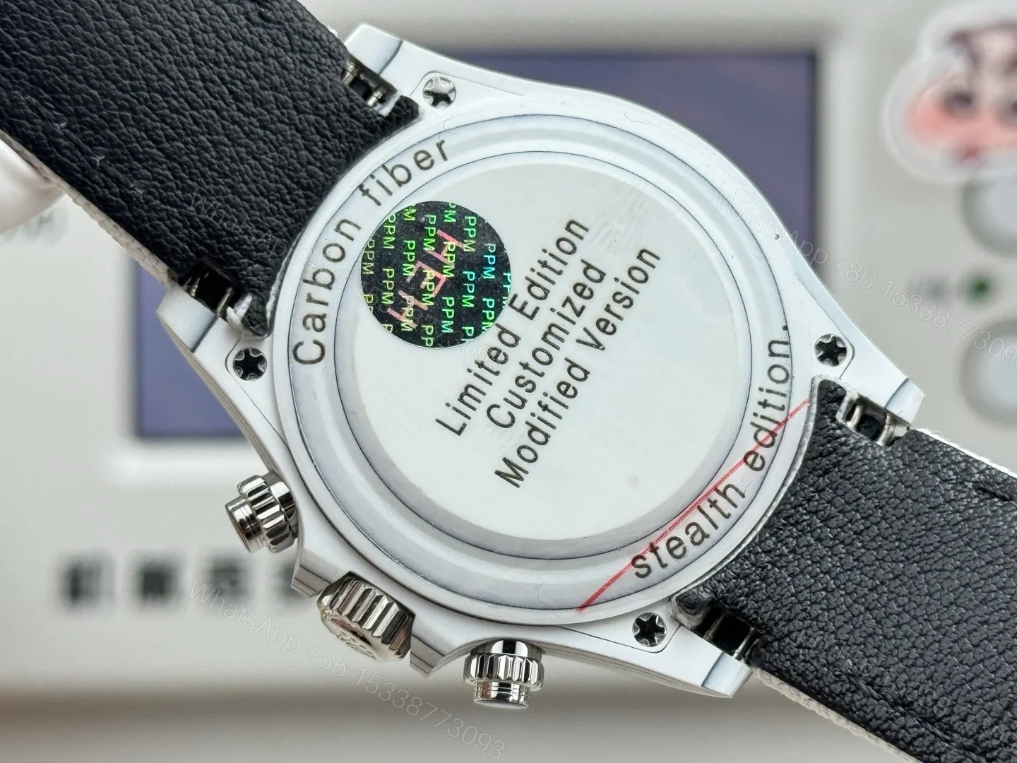 View 8 of Rolex Daytona Carbon Fiber White Replica 40MM Exclusive Orange Bezel White Fabric Strap R74 RG-ROLEX-DAYTONA-WHITE-DIAL