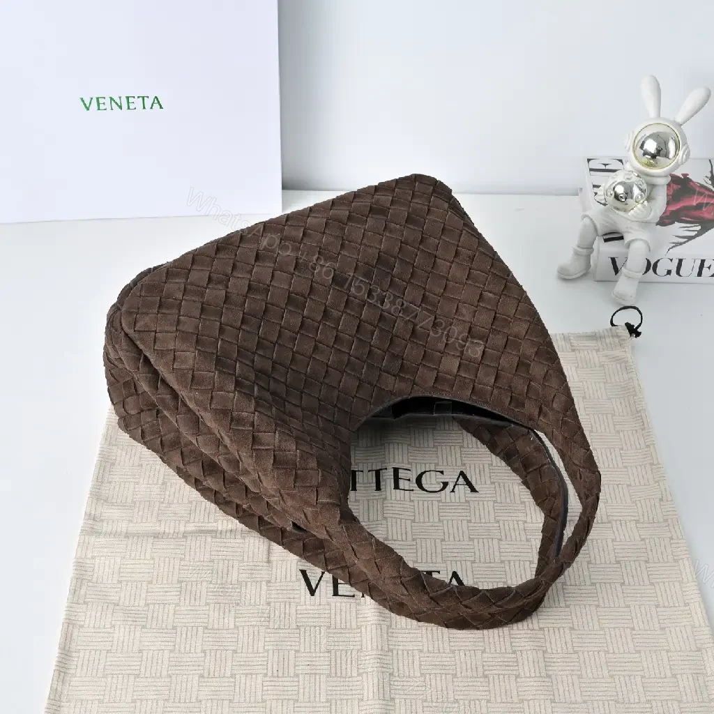 View 9 of brown woven leather hobo bag with intrecciato texture for everyday luxury