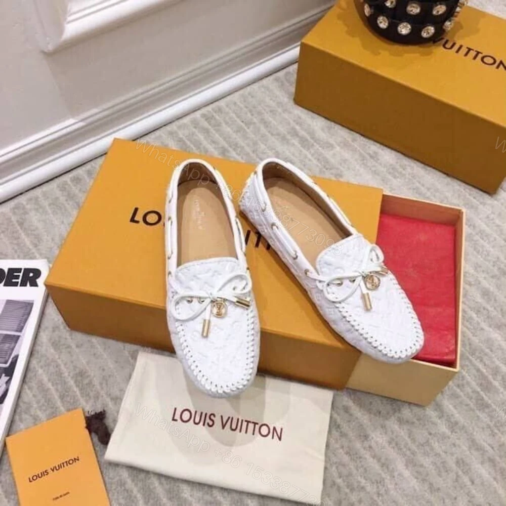 View 5 of LOUIS VUITTON WHITE MONOGRAM EMPREINTE LEATHER GLORIA LOAFERS