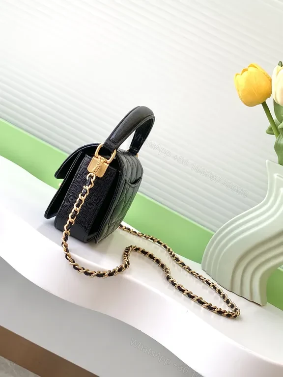 View 5 of Chic Quilted Mini Bag: Black Leather, Gold Accent, Structured Crossbody