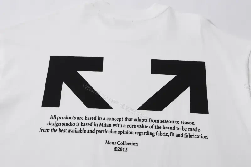 View 9 of Minimalist White Tee: Premium Cotton, Subtle Logo, Everyday Luxury