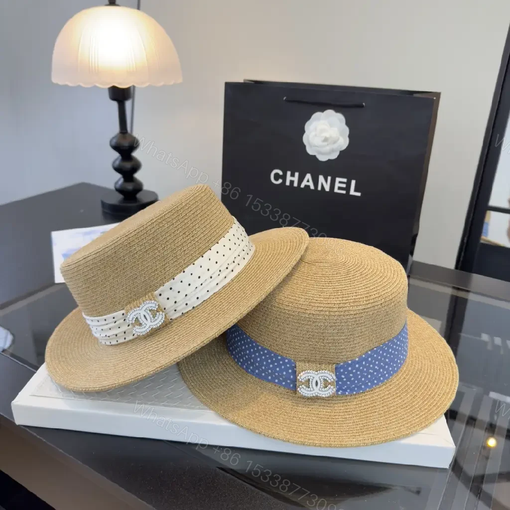 View 2 of Natural Tan Straw Boater Hat with Blue Polka Dot Band and Chanel Clasp