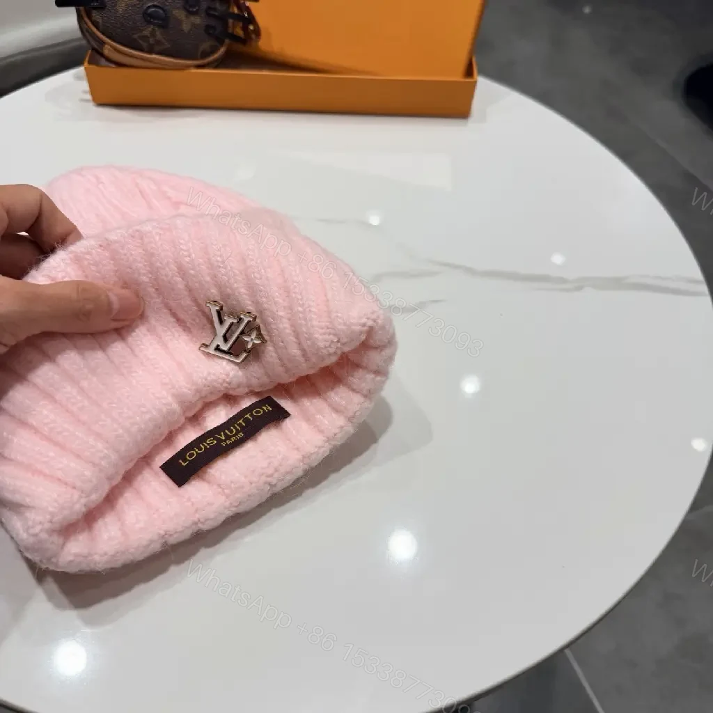View 9 of Pastel Knit Beanie with Silver Emblem – Luxe Everyday Accessory