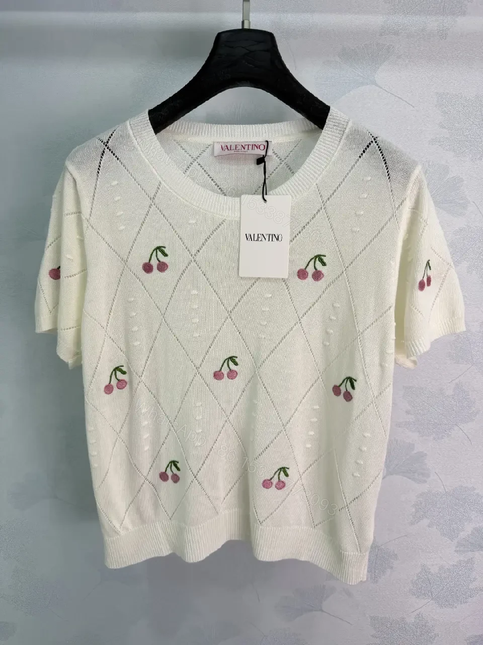View 2 of Cream/Light Heather Knit V-Neck Cropped Argyle Diamond Top