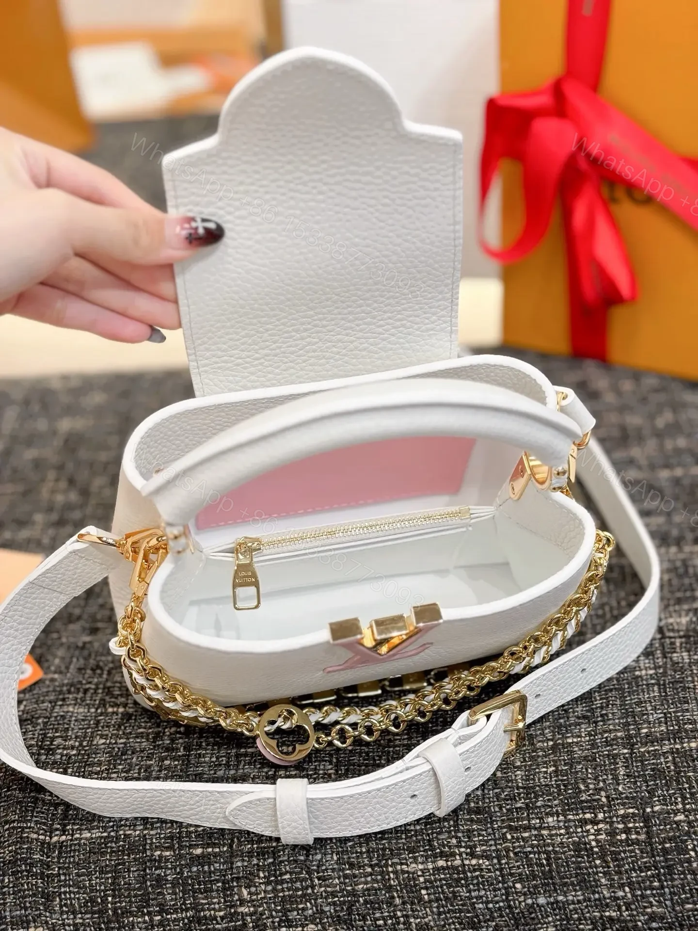 View 4 of Louis Vuitton Capucines bag in white Taurillon leather
