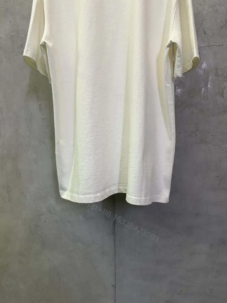 View 4 of Oversized White Cotton Tee with Bold CELINE Arch Graphic