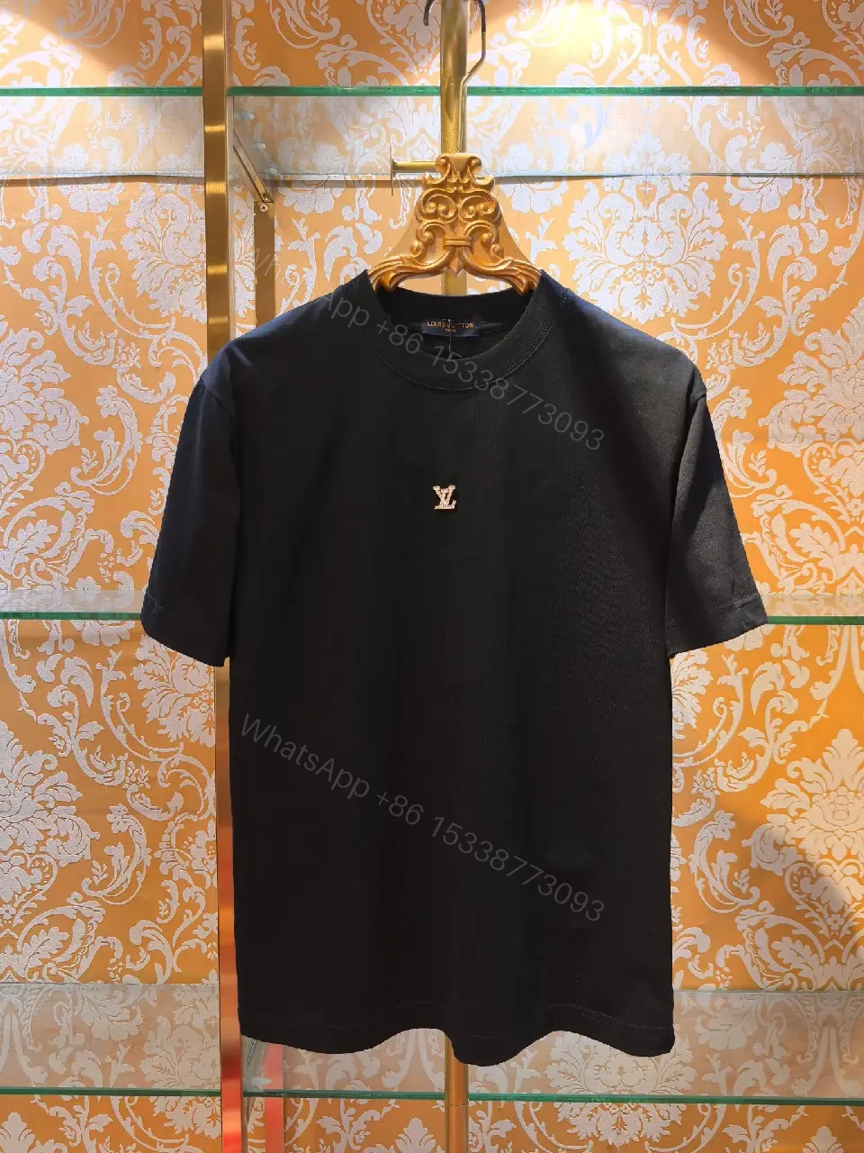 View 6 of Minimalist Black Cotton Tee with Subtle LV Emblem