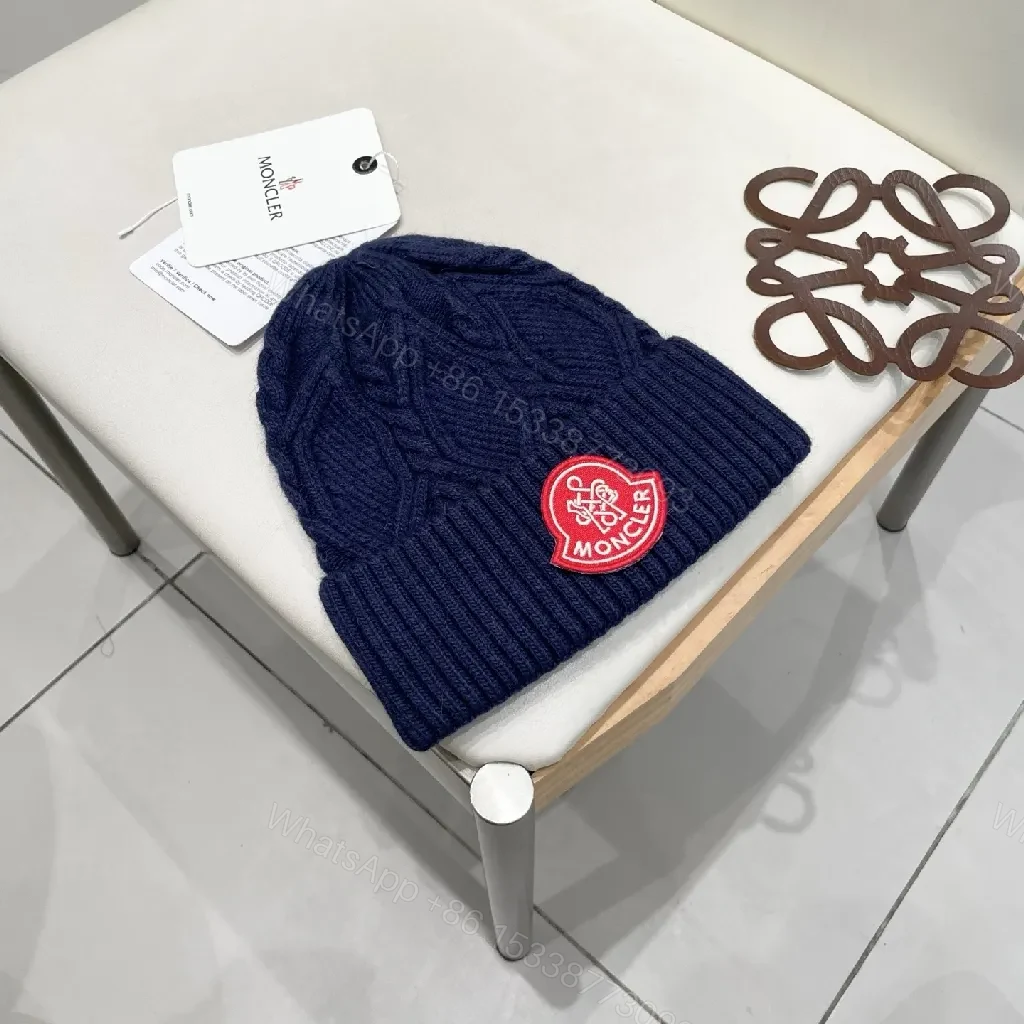 View 6 of Cozy Navy Knit Beanie with Ribbon Patch