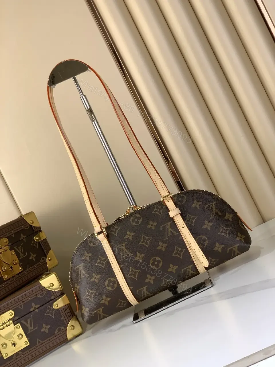 View 10 of Chic Monogram Barrel Bag: Structured, Luxurious Carryall