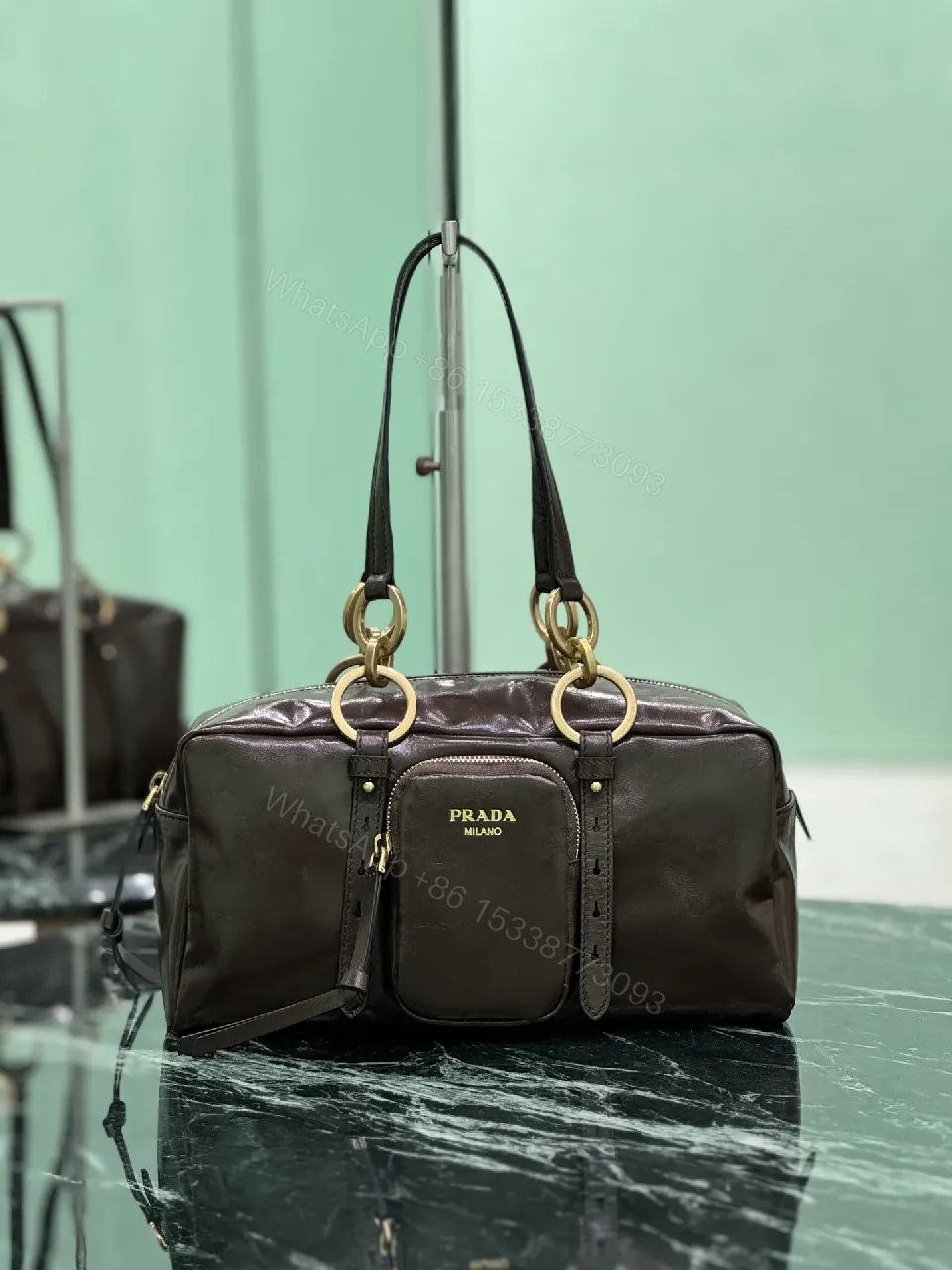 Chic Black Leather Handbag with Gold Hardware & Structure — view 1