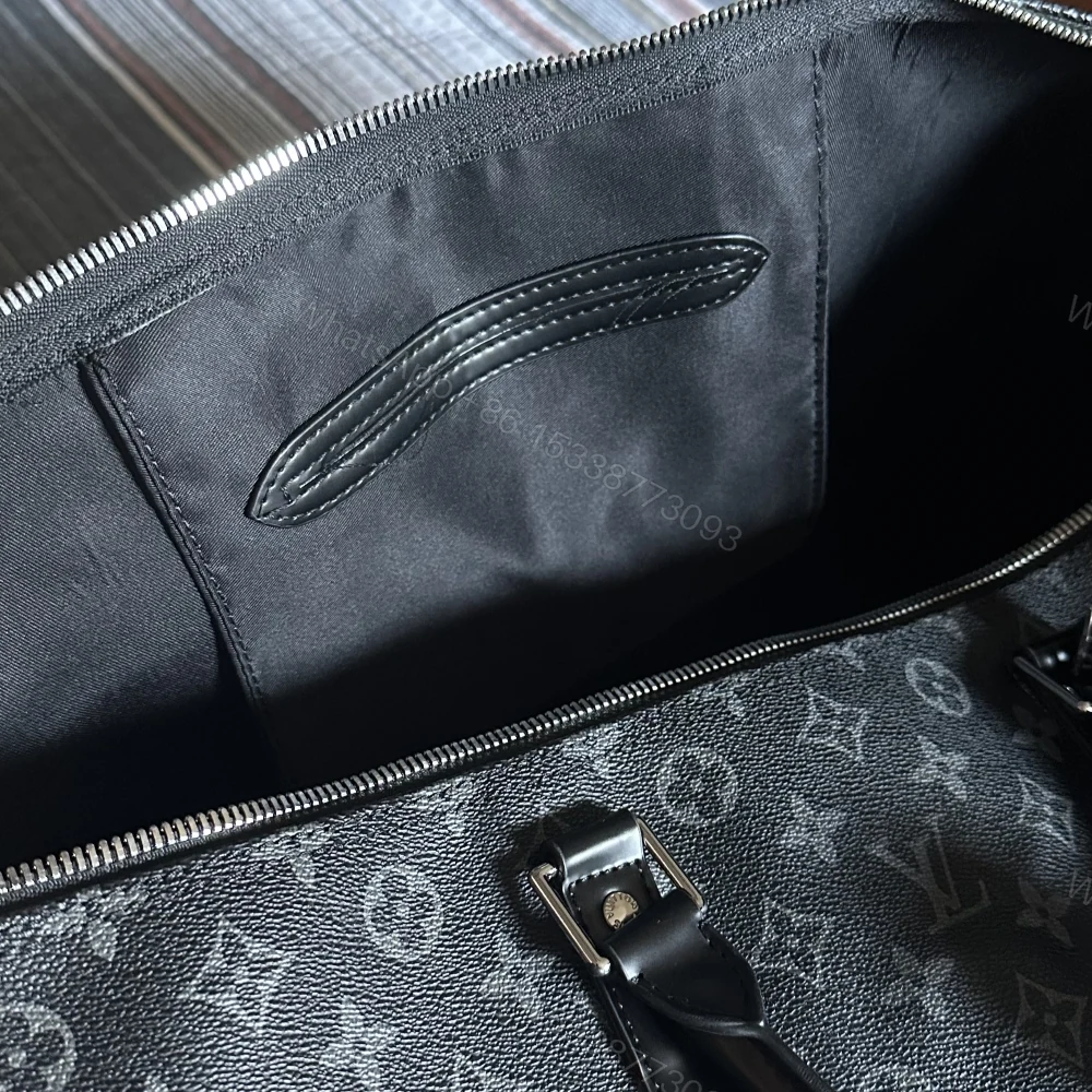 View 8 of Louis Vuitton Keepall Bandouliere 55 Monogram Eclipse Canvas 55cm LV M40605