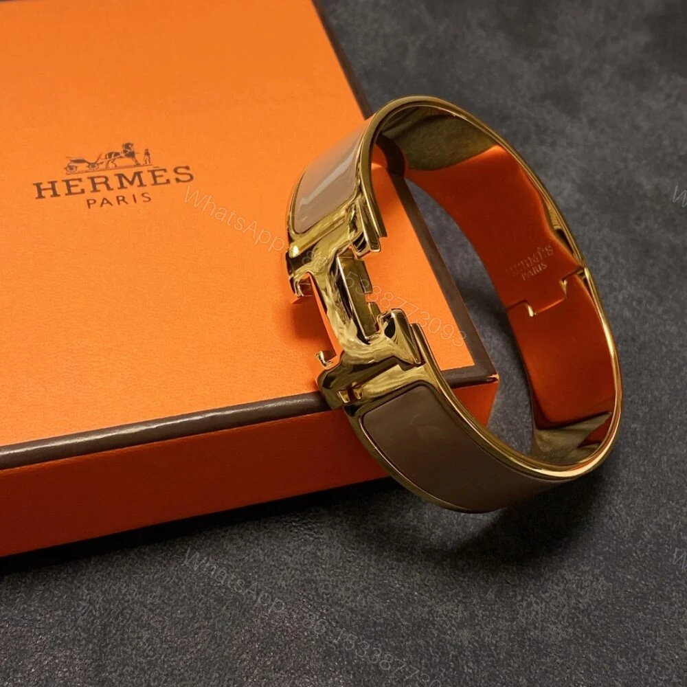 View 5 of Hermes Clic H Wide Bracelet Gold & Beige