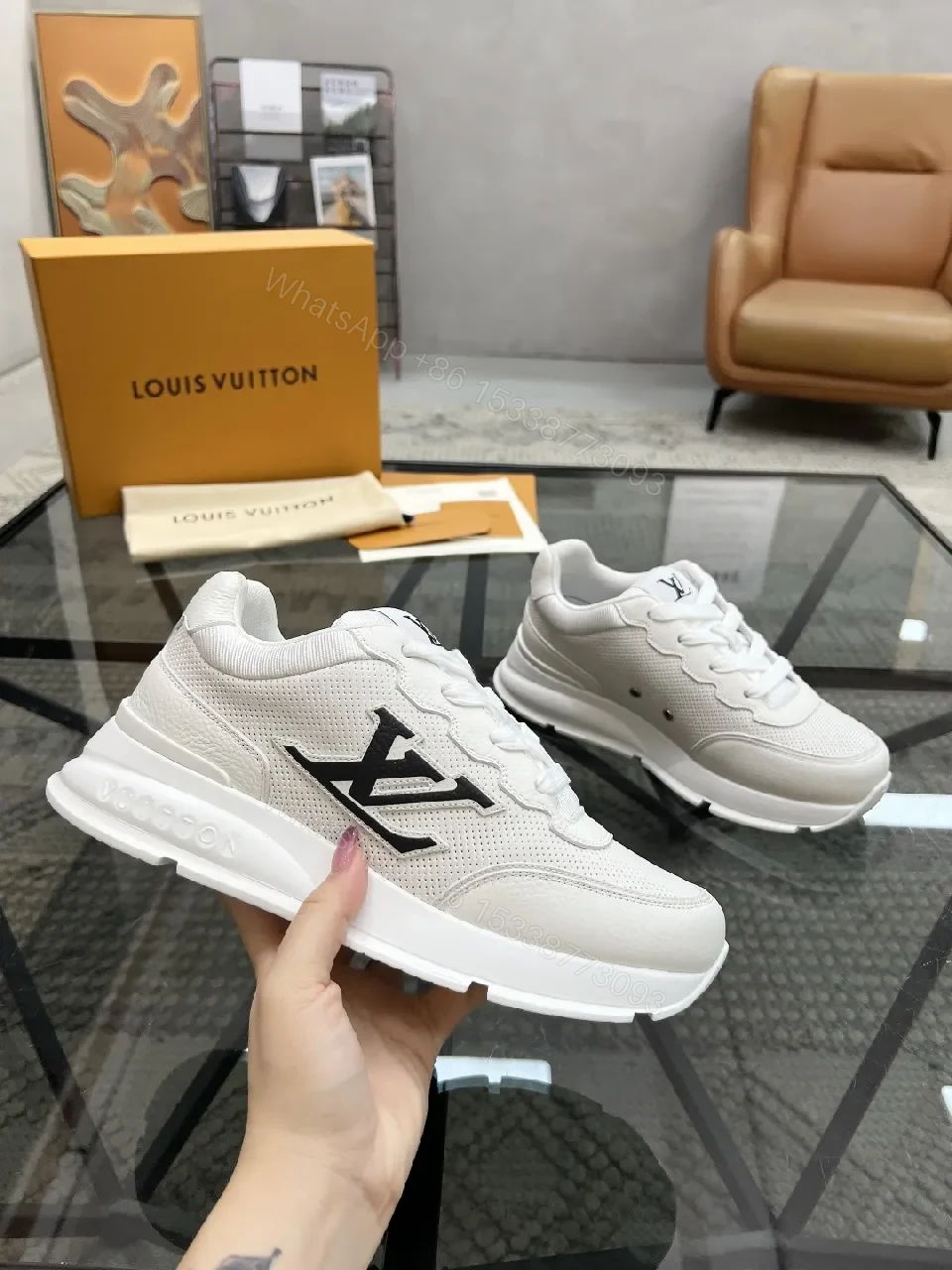 View 5 of White Leather Low-Top Luxury Sneakers with Subtle Logo Detail