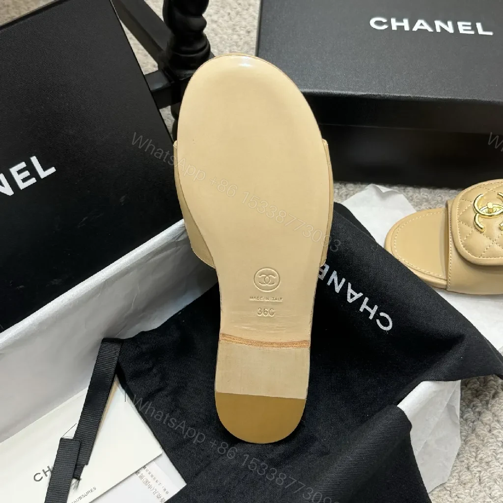 View 6 of Beige Quilted Leather Sliders with Gold Logo—Elegant Comfort