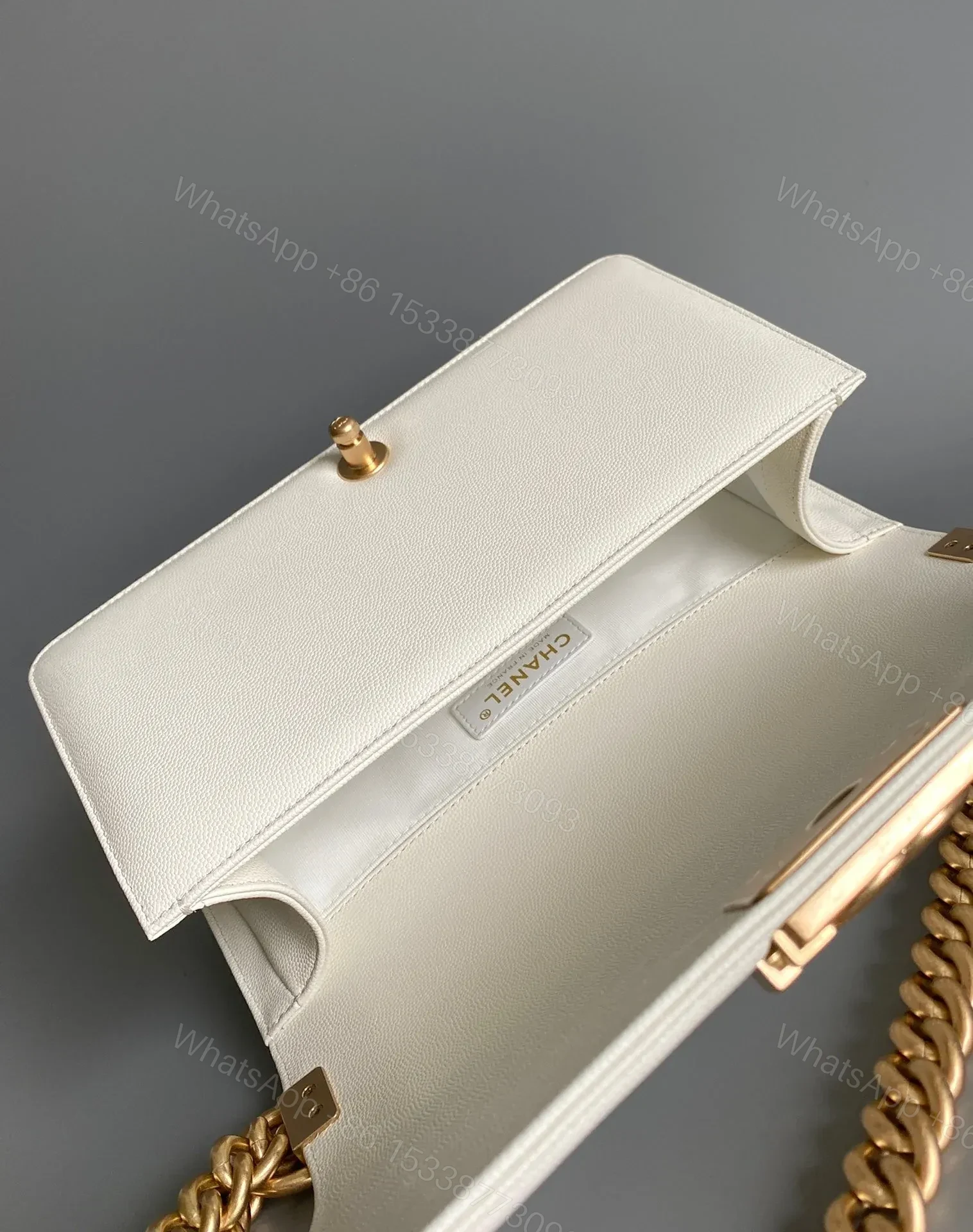 View 6 of CHANEL MEDIUM 25 BOY BAG IN WHITE LAMBSKIN GOLD HARDWARE