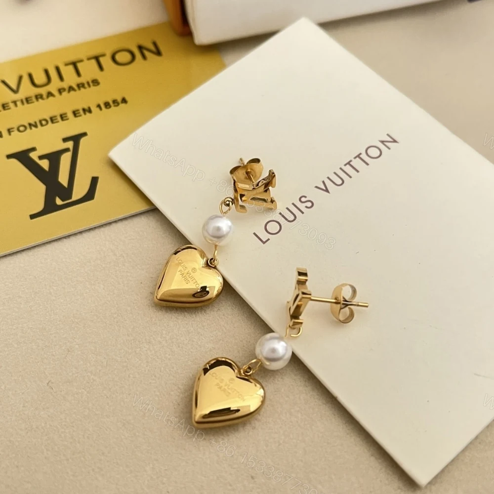 View 2 of Louis Vuitton LV Heart Earrings Gold M01011