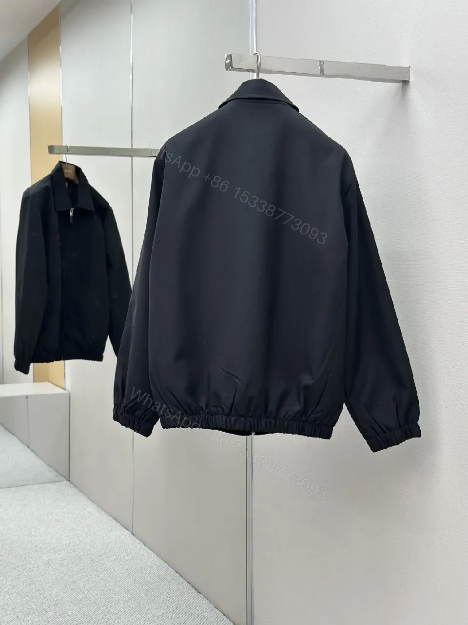 View 5 of Minimalist Black Coach Jacket: Premium, Wind-Resistant Utility Jacket