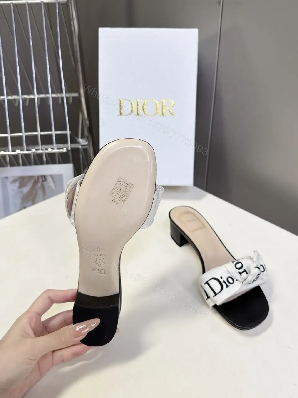 View 2 of White Metalized Bow Dior-Logo Canvas Sandals