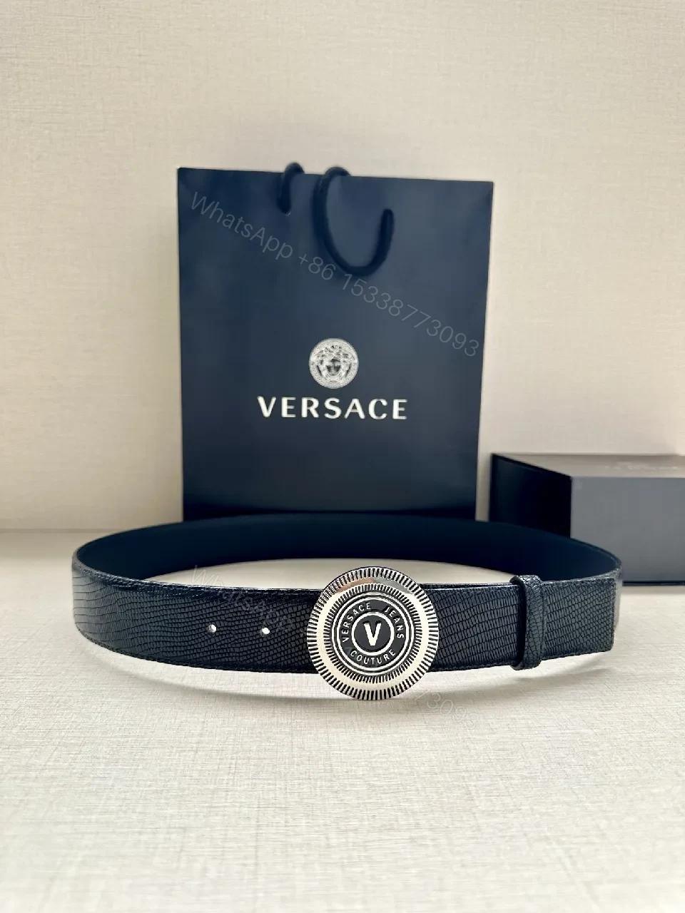 Textured Leather Belt with Round Emblem Buckle – Luxe Minimalist Style — view 1
