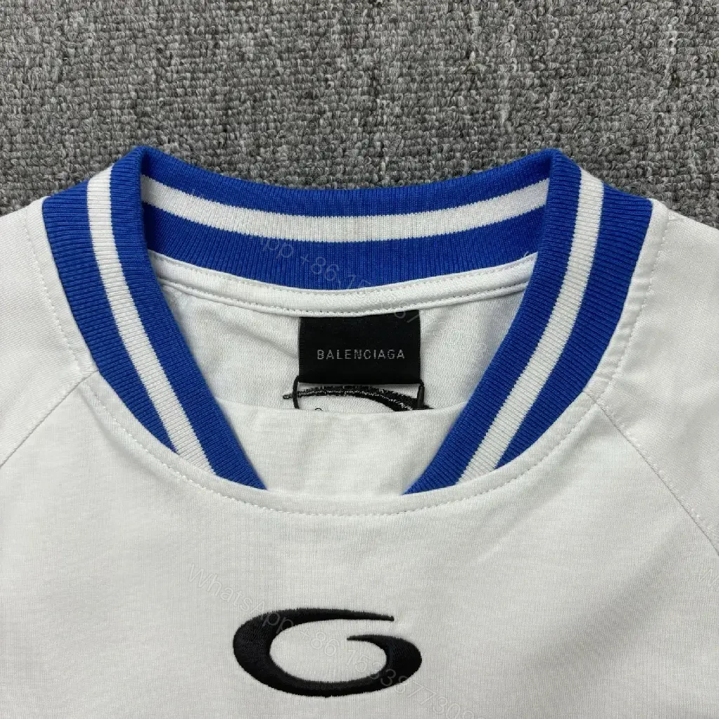 View 2 of Bold Black-White Statement Jersey Tee with Electric Blue Accents