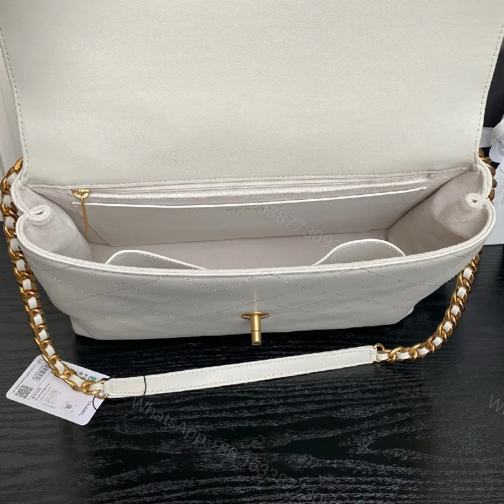 View 9 of Quilted Leather Handbag: Subtle Shine, Iconic Silhouette