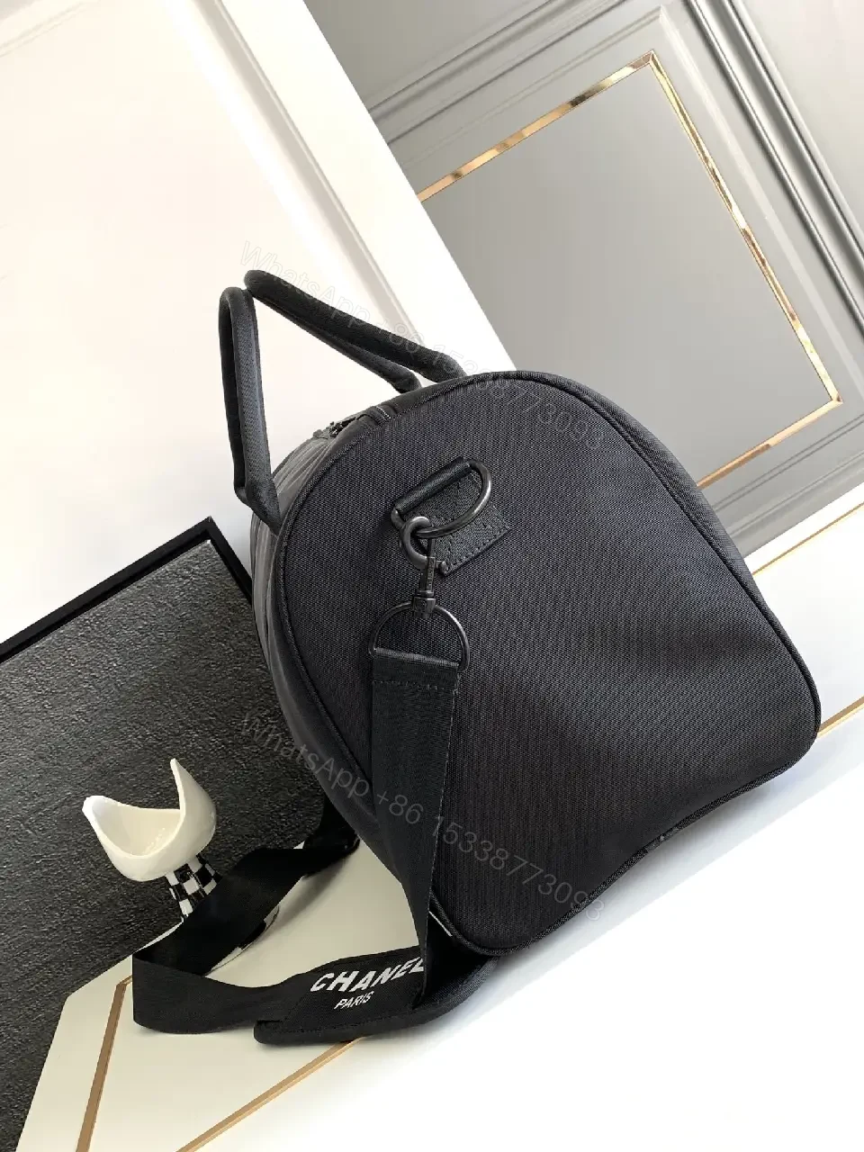 View 9 of Structured Black Travel Bag: Matte, Signature Emblem, All-Day Ready