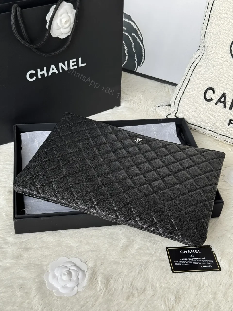 View 8 of Compact Black Quilted Leather Clutch with Silver Logo