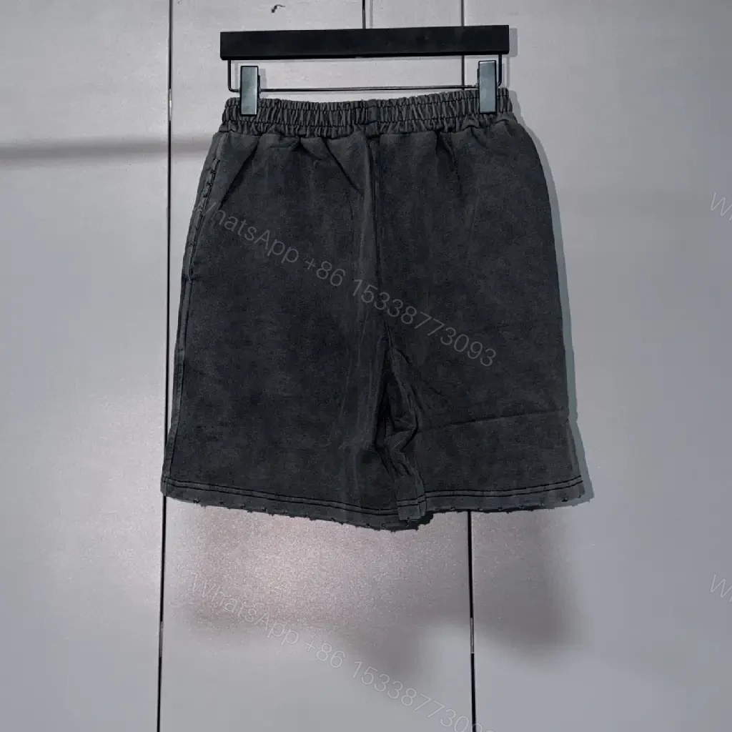 View 6 of Black Denim Shorts with Logo Accent, Balenciaga Style, Key Feature: Drawstring Washable Design