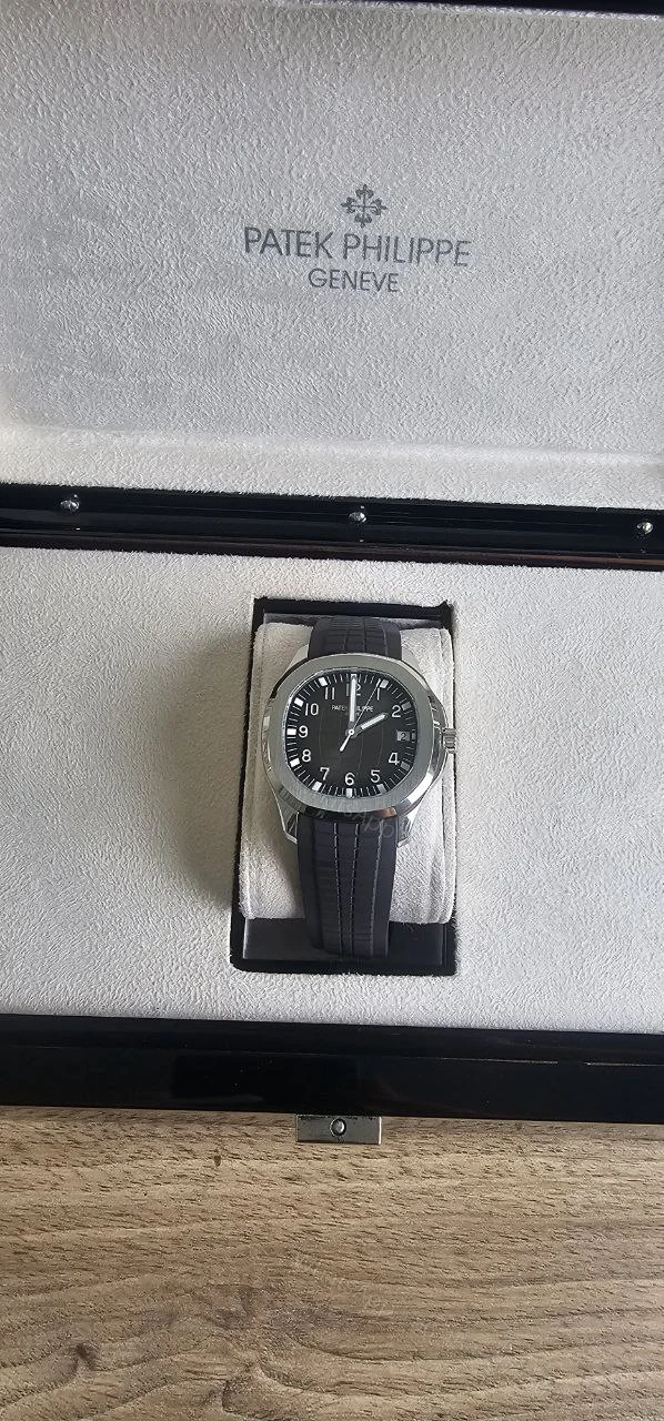 View 3 of Patek Philippe Aquanaut Rose gold with box and papers