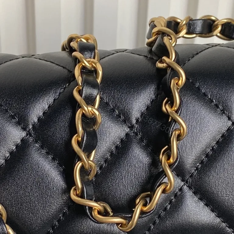 View 9 of Black Quilted Shoulder Bag with Gold Chain - Compact Luxury Bag