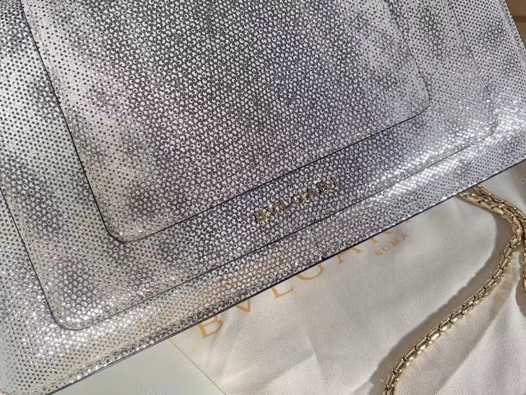 View 8 of Statement Metallic Handbag: BVLGARI x Katrantzou Bracelet Clasp Crossbody