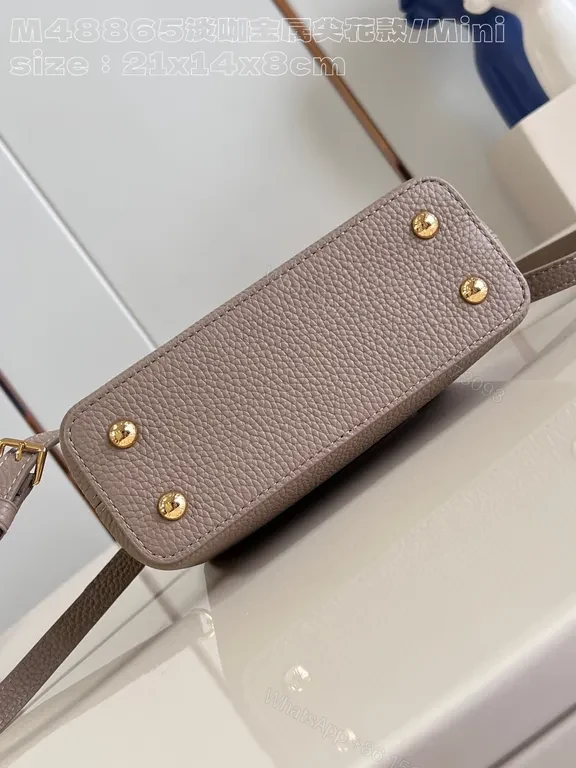 View 7 of Taupe Pebbled Leather Crossbody: Gold LV Accent, Compact Luxury Bag