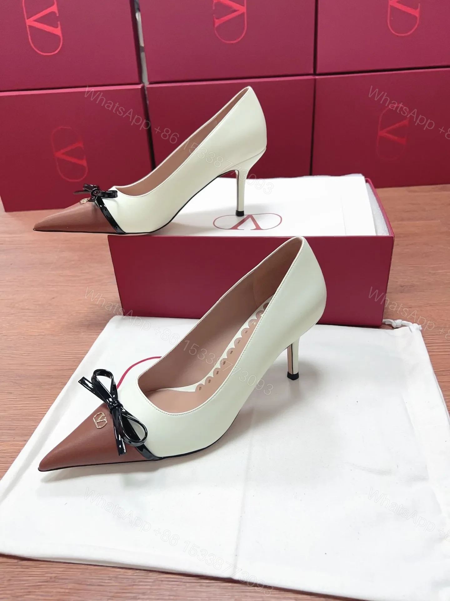 View 5 of Valentino Women White Leather Brown Bow Detail Pumps