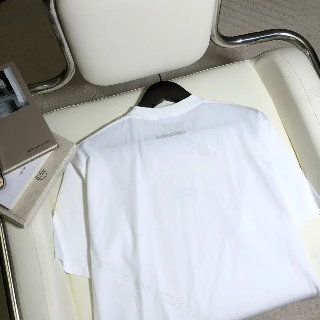 View 3 of white cotton oversized tee with logo motif premium everyday luxury