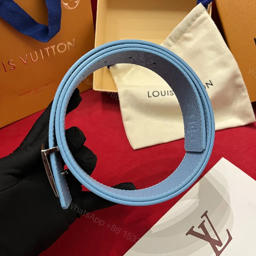 View 9 of Light-Blue Pebbled Leather Belt with Monogram Detail