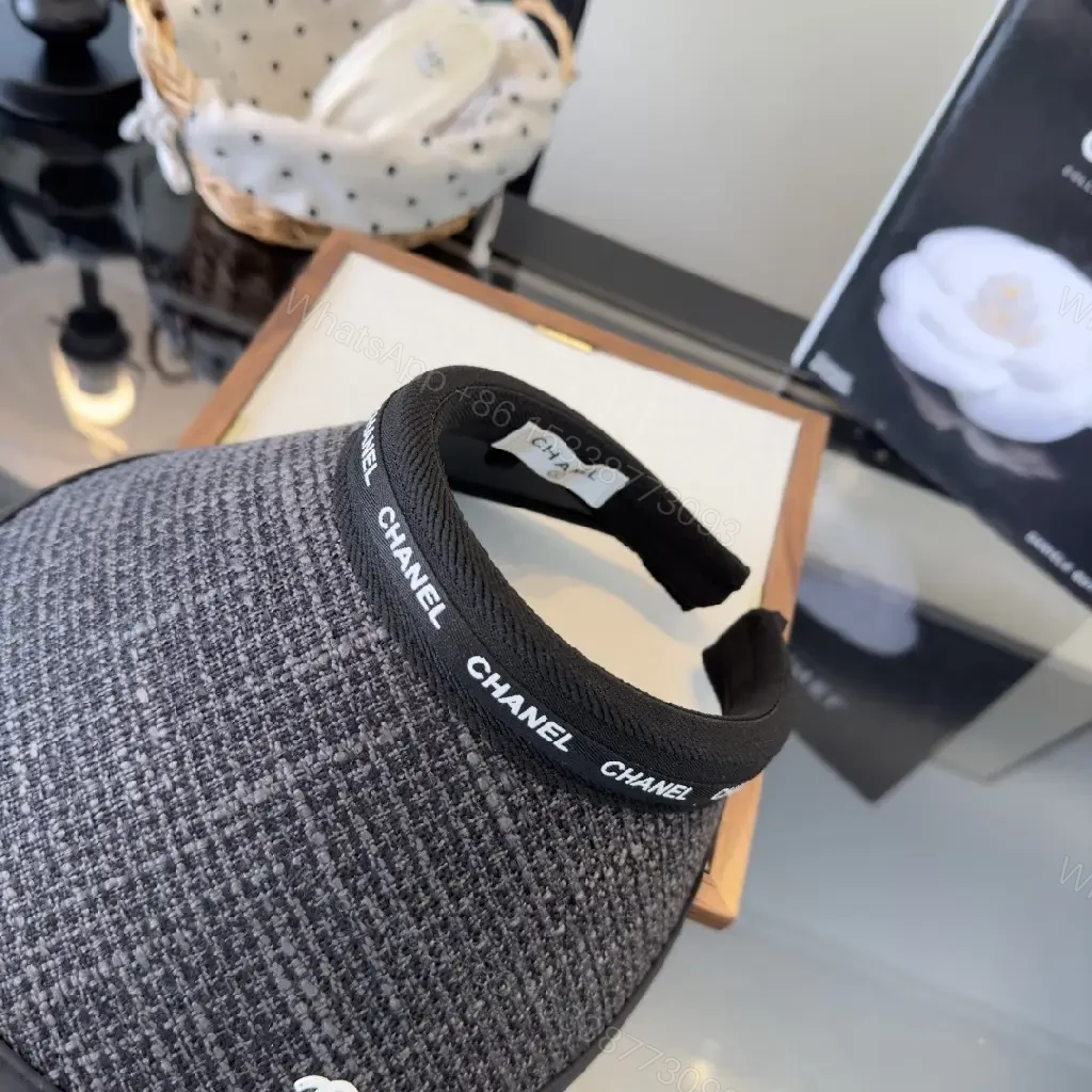 View 8 of Dark Gray Tweed Visor Cap with White Chanel Logo and Silver Emblem