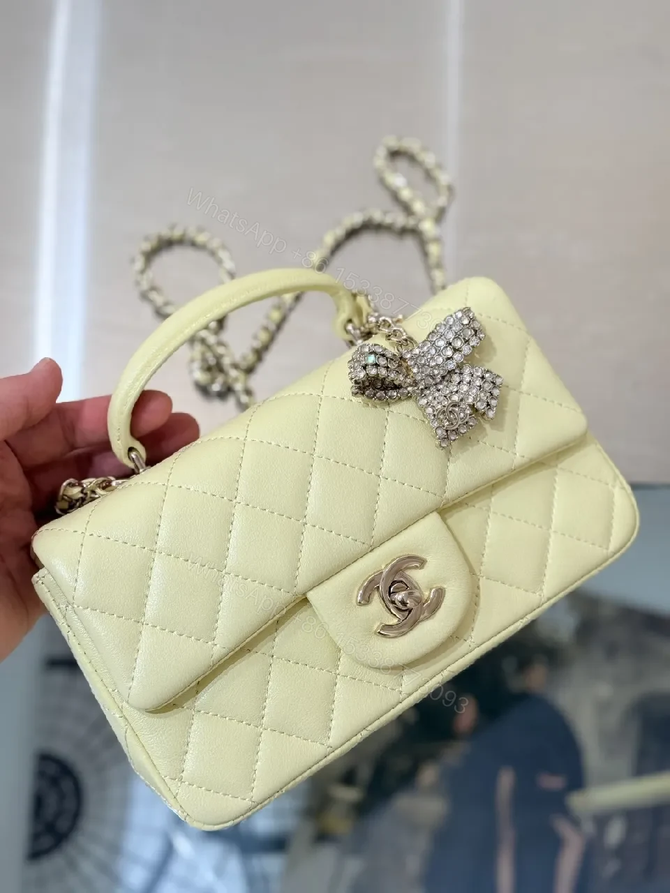 View 4 of Pale Leather Quilted Mini Bag with Chain Detail