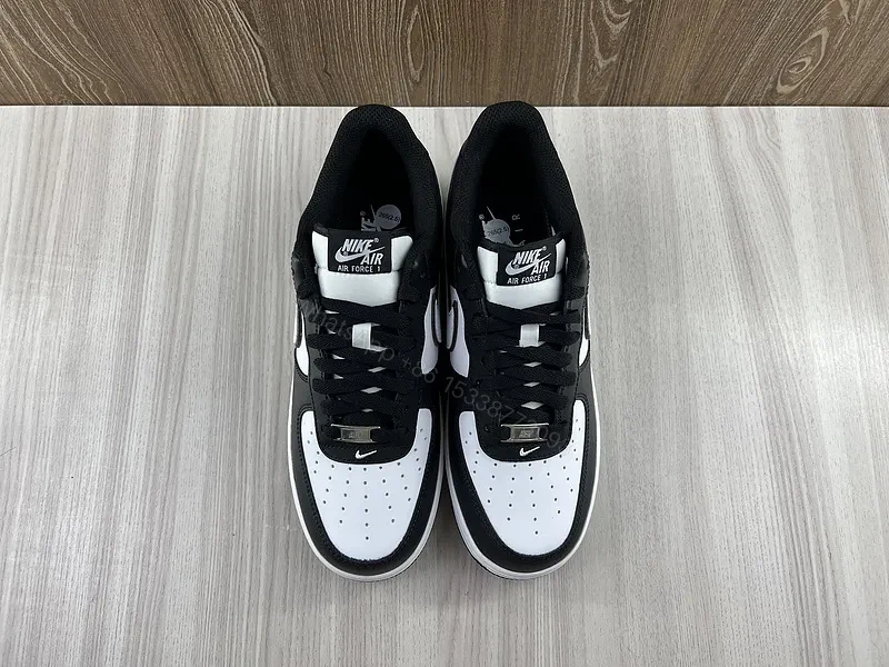 View 8 of Black Leather Low-Top Sneakers with Signature Swoosh