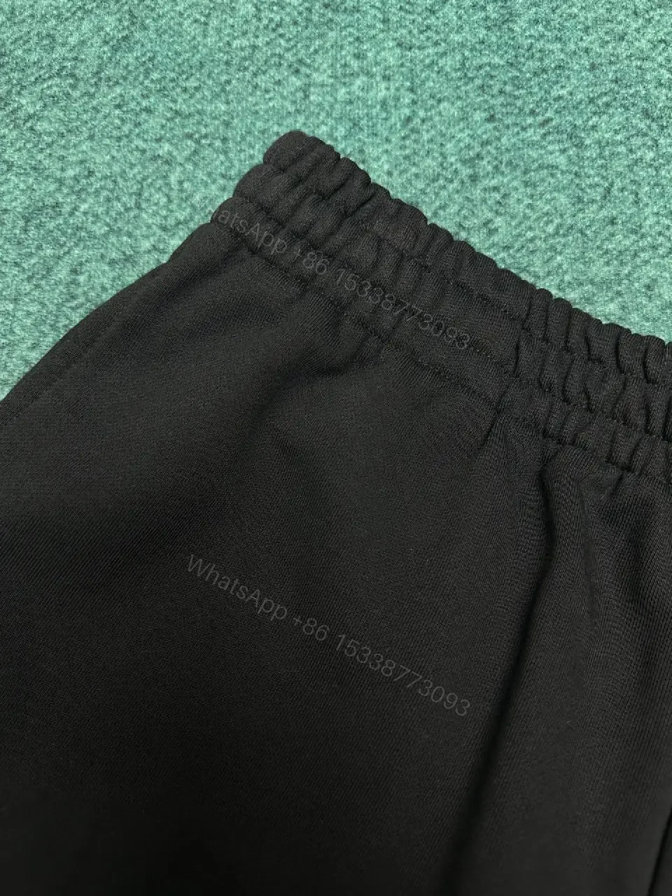 View 9 of Black Quick-Dry Swim Shorts | Minimalist, Structured, All-Day Comfort