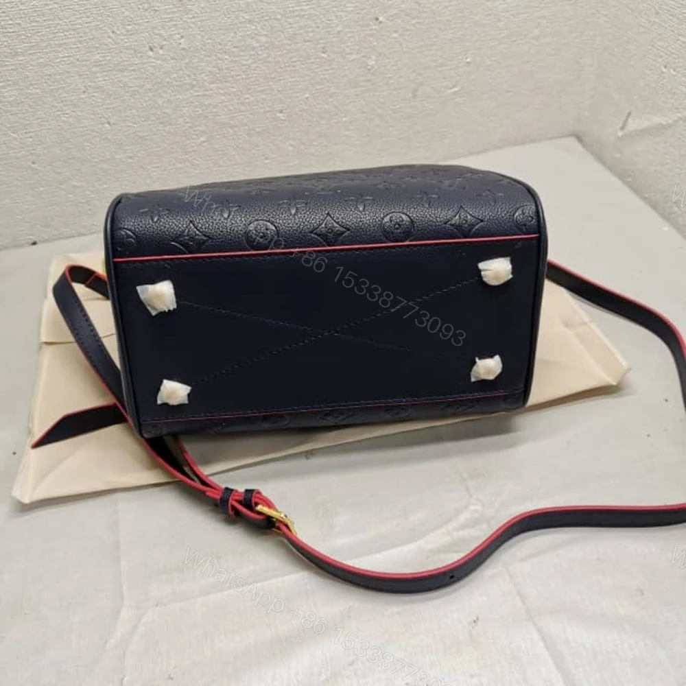 View 4 of Louis Vuitton Speedy Bandoulière 25 In Monogram Empreinte Navy 25Cm M43501