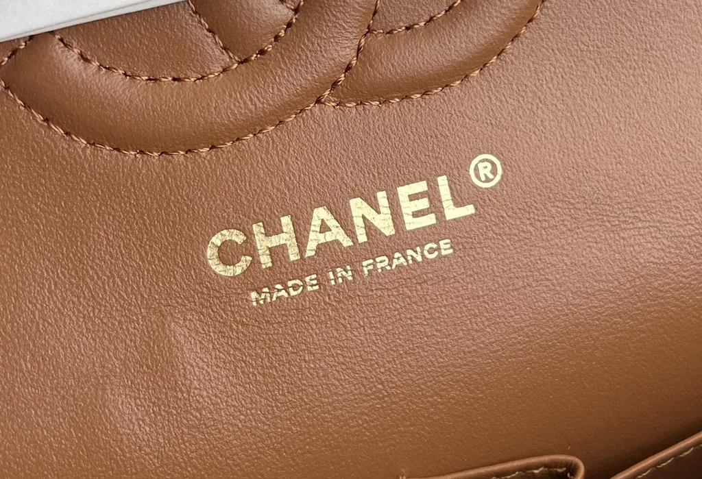 View 7 of Textured Quilted Saddle Bag with Signature Hardware - Brown Leather