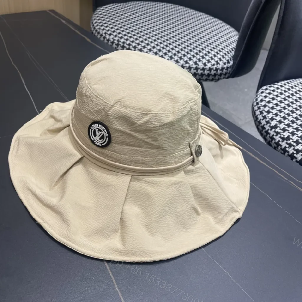 View 5 of Beige Textured Bucket Hat with Emblem, Everyday Luxury